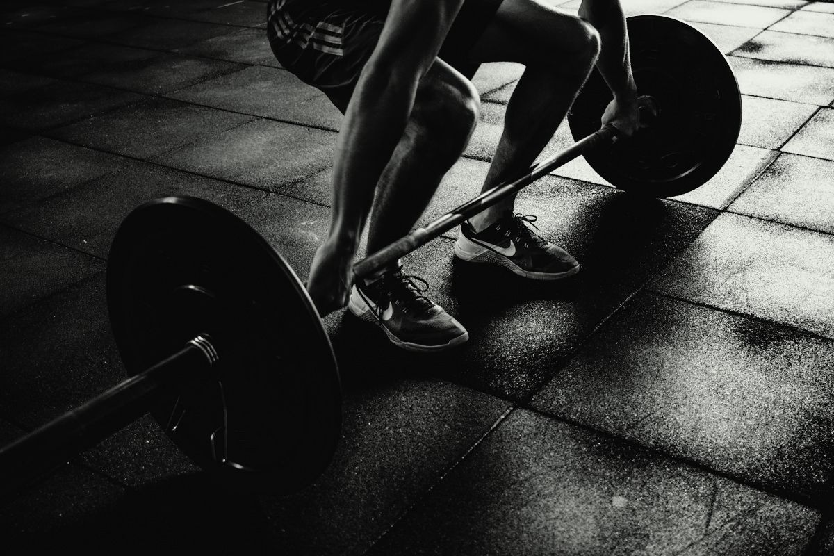 Close-up of a lifter setting up for a deadlift