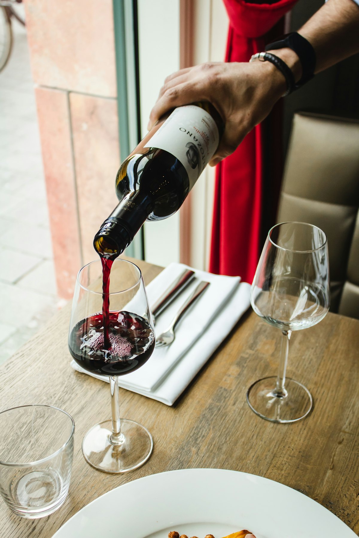 Red wine being poured